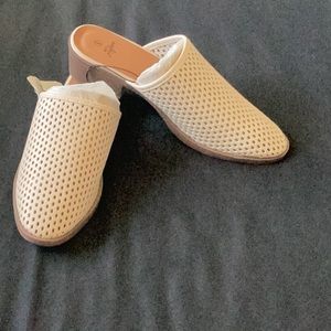 Woman’s size 8 laser cut ivory mules.perfect for summer